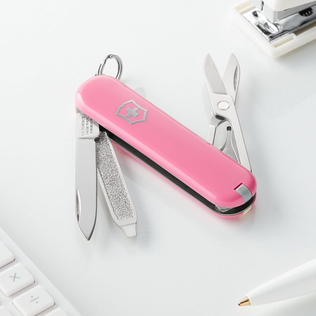 Victorinox Classic SD Swiss Army Knife, Compact, 7 Functions, Swiss Made Pocket Knife with Small Blade, Screwdriver and Key Ring - Cherry Blossom (Pink)