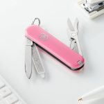 Victorinox Classic SD Swiss Army Knife, Compact, 7 Functions, Swiss Made Pocket Knife with Small Blade, Screwdriver and Key Ring - Cherry Blossom (Pink)